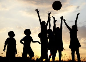 kids play games outside during summer