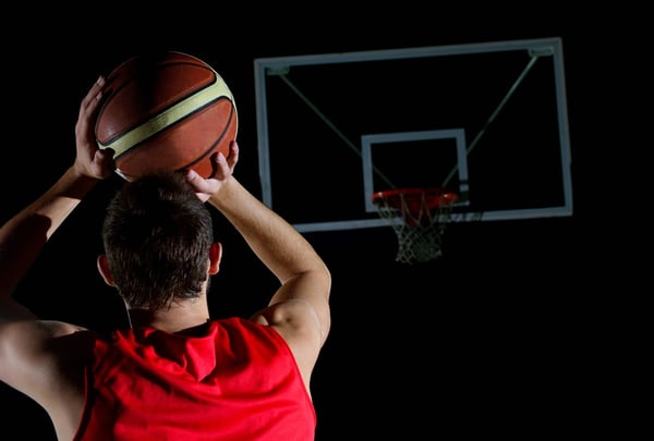 basketball game sport player in action isolated on black background