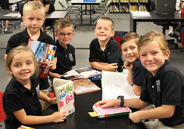 young students reading books