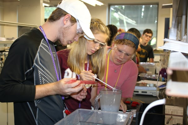 summer science camp students experiment